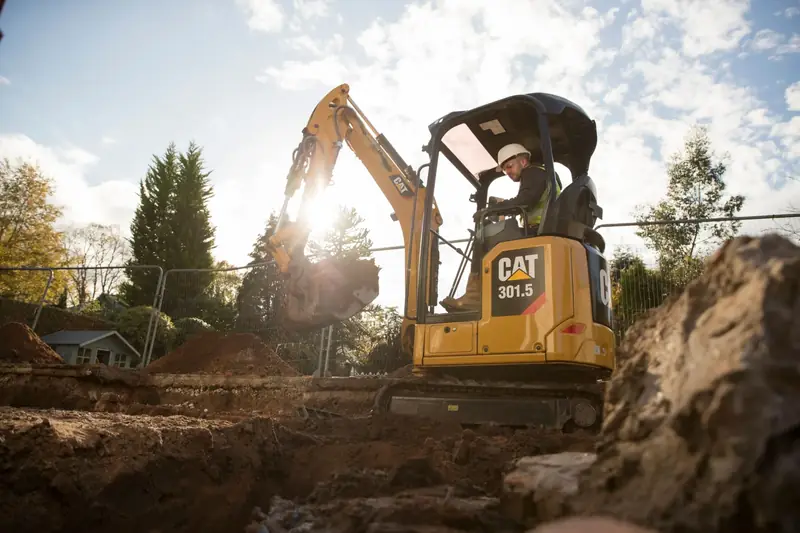 Mini excavator during earthworks